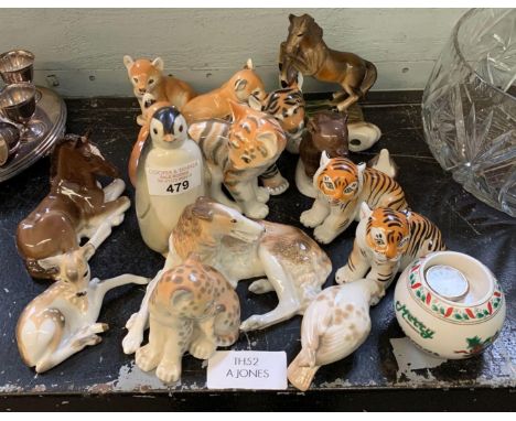 VARIOUS CERAMIC ANIMALS MAINLY MARKED MADE IN USSR INCLUDING HORSES, TIGERS, DOGS, PENGUIN ETC