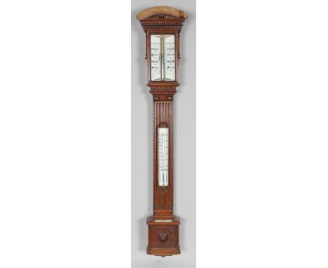 A GOOD VICTORIAN OAK STICK BAROMETER, Retailed by KELVIN-JAMES WHITE LTD OPTICIANS, GLASGOW, with two ivory dials, 10cm Yeste