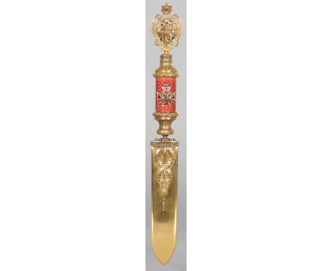 "FABERGE", AN ENAMEL AND GOLD PAPER KNIFE, with double eagle head pommel, machine turned and pink enamelled handle with appli