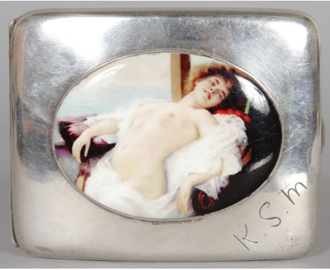 A SILVER CIGARETTE CASE, Birmingham 1938, with later applied enamel of a reclining nude. 4ins wide.