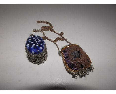 A small Eastern oval metal trinket/snuff box the dark blue glass cover patterned with stars together with a bead &amp; mirror