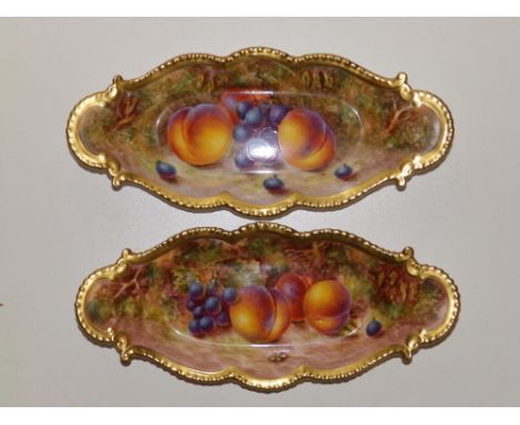 A pair of Royal Worcester fruit plated oval dishes by C. Bowen, 10" across.