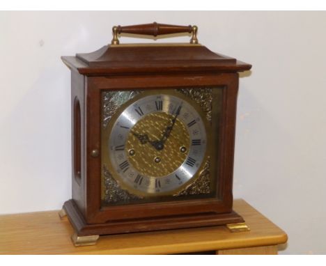 A Westminster chiming mantel clock.