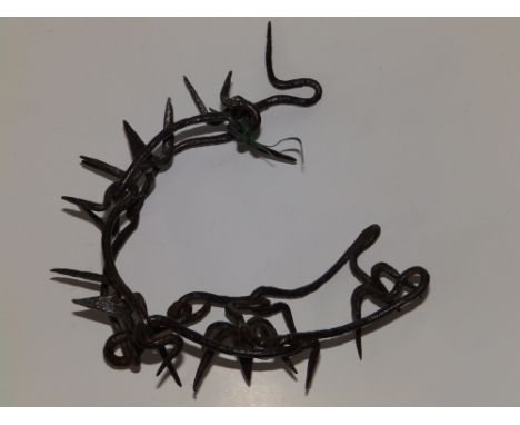 A 17thC spiked hunting dog collar.