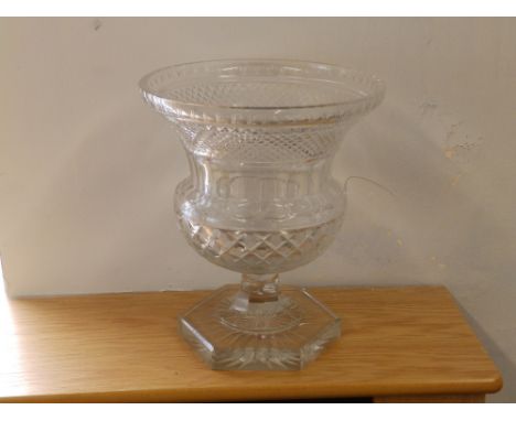 A 19thC urn shaped cut glass vase on hexagonal foot, 9.5".