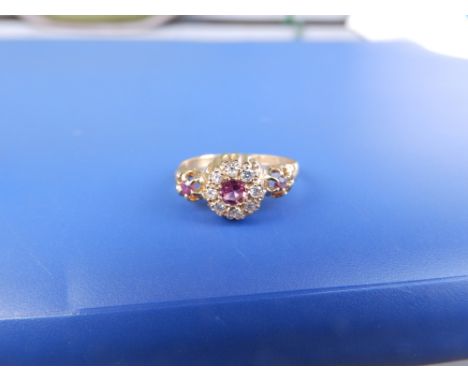 A small late 19th/early 20thC ruby &amp; diamond 18ct gold cluster ring - Chester marks.  Finger size K.