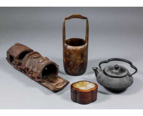 A Japanese cast iron teapot and lid with swing handle, of compressed form, 5ins (12.7cm) x 3ins (7.7cm) high, a Chinese hardw
