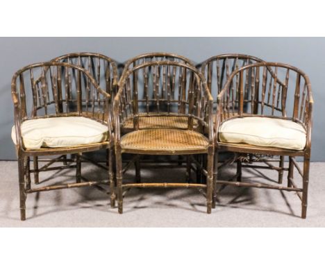 A set of six early 20th Century painted beechwood tub-shaped and spindle back Bergere armchairs with bamboo pattern frames, c