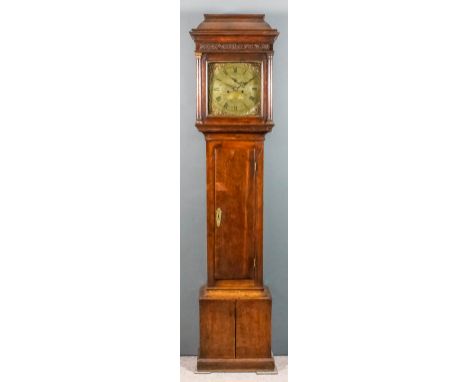 An 18th Century oak longcase clock by John Snelling of Alton, the 12ins square brass dial with wide chapter ring with Roman a