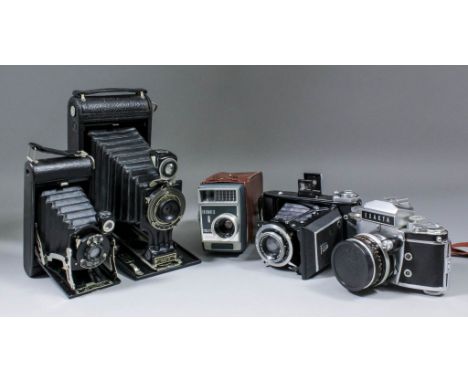 A Kodak Jr. No. 3-A "Autographic" plate camera and original case, a Kodak No. 1 pocket camera, and a Zeiss Ikon plate camera 