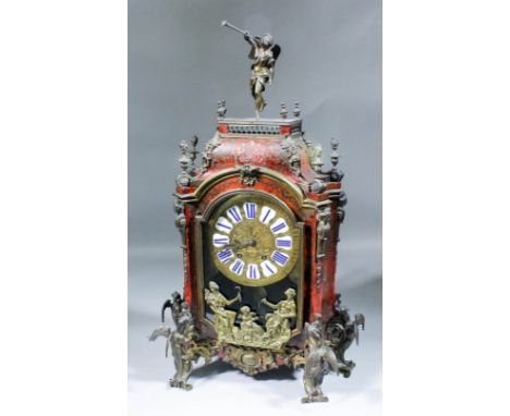 An early 18th Century French red tortoiseshell and Boulle mantel clock of Louis XIV design with 19th Century movement by Vinc