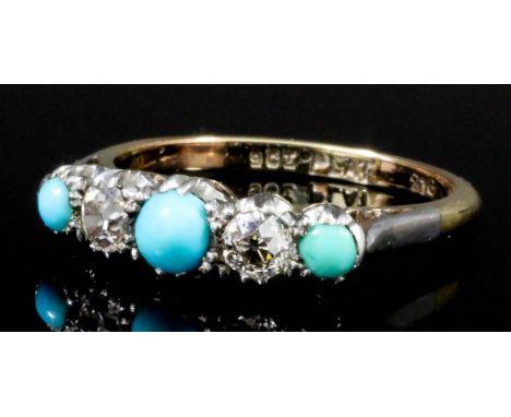 An Edwardian 9ct gold mounted turquoise and diamond set five stone ring, the central cabochon cut turquoise shouldered by two