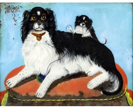 19th Century English school - Reverse painting on glass - Portrait of a black and white spaniel and her puppy seated on a cus