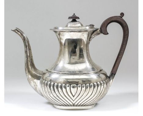 An Edward VII silver oval coffee pot with gadroon mounts, part reeded body, ebonised finial and C-scroll handle, 8.5ins high,