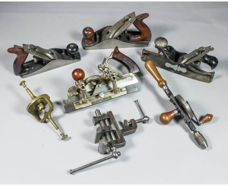 A Stanley steel jack plane, two other metal jack planes, a Stanley No. 45 adjustable moulding plane (no blades), a set of dra