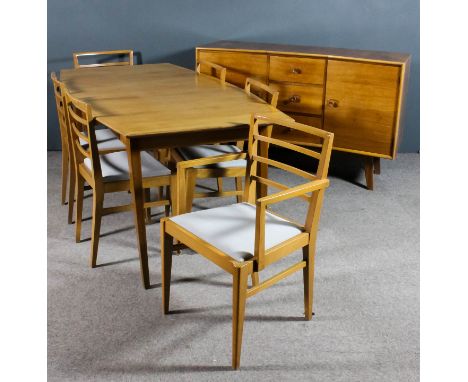A 1950s teak and beechwood dining suite retailed by Heals, comprising - rectangular dining table on square tapered legs, 68in