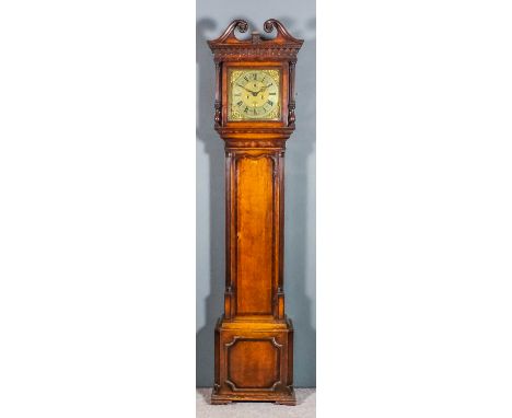 A late 18th Century oak and mahogany banded longcase clock by Peter Walker of London, the 12ins square brass dial with Roman 