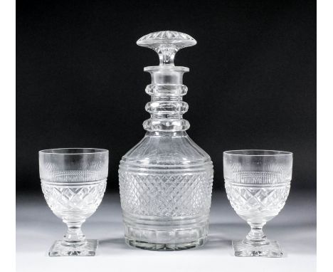 A 19th Century diamond and slice cut three ring decanter and mushroom stopper, 12.5ins high (neck ground), and a pair of diam