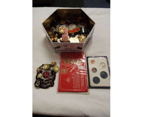A collection of military buttons, cap badges, enamel Dunkirk pin badges, assorted coins of the world, medals etc 