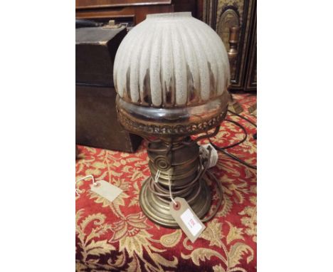 A French brass table lamp with glass shade
