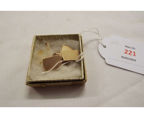 A pair of gentleman's 9ct gold cufflinks with engine turned decoration  Weighs approx 7.6 grams
