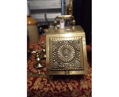 A Victorian brass coal box together with a pair of brass fire dogs and tool rest