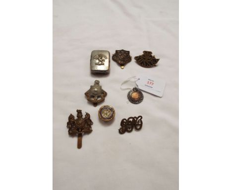 A selection of military interest items to include a Queens Own West Kent silver-plated vesta case and enamel Hove Volunteers 