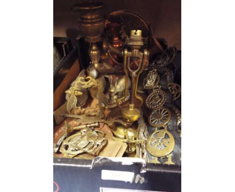 A selection of assorted copper and brass ware to include a pair of pheasants, ewer's, a Playmit ship's lamp, horse brasses et