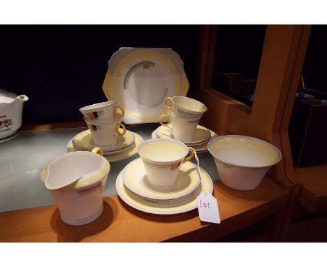 An Art Deco Shelley Regent shape yellow ground part tea-set pattern No W12288  In need of a good clean, five tea plates, six 