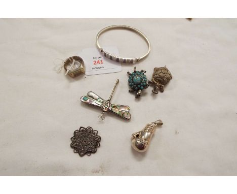 A small quantity of silver and tone jewellery items to include boxing glove pendant, bangle, abalone set dragonfly brooch etc