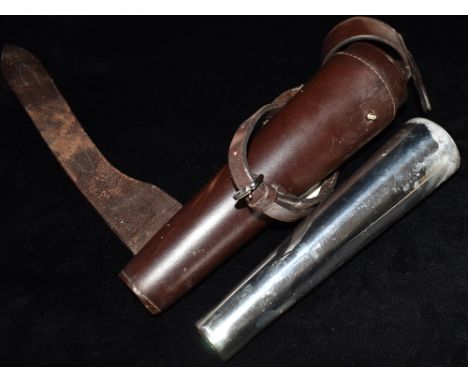 A SHEFFIELD PEWTER CRAFT COMPANY FLASK  in a brown leather holder for saddle mounting, 28cm long