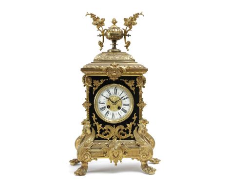 A FRENCH BRASS AND LACQUERED MANTEL CLOCKLATE 19TH CENTURYthe brass eight day drum movement by Japy Freres with an outside co