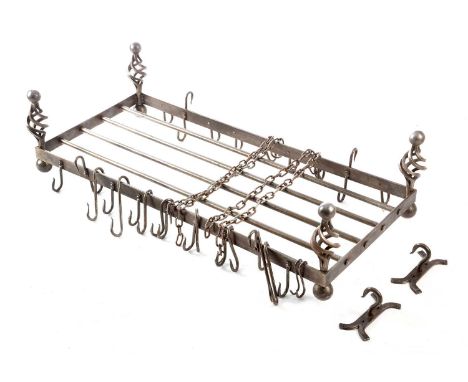 A WROUGHT IRON KITCHEN UTENSIL RACK20TH CENTURYof rectangular form with twisting and ball finials and a series of hooks to ea