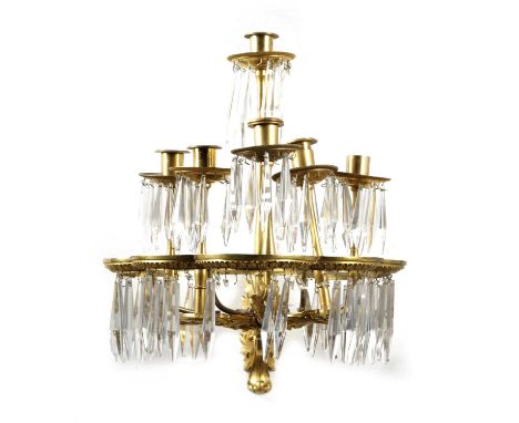 A PAIR OF FRENCH GILT BRONZE WALL LIGHTSIN REGENCE STYLE, LATE 19TH CENTURYeach with six candleholders with drip-pans suspend