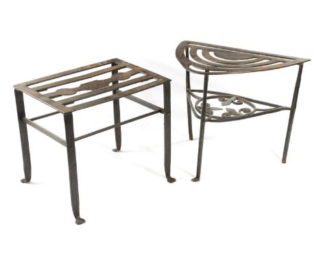 A STEEL TRIVET19TH CENTURYwith a pierced bowfront top above a lower shelf, together with a footman (2)35.5 x 42.2 x 30.6cm (m