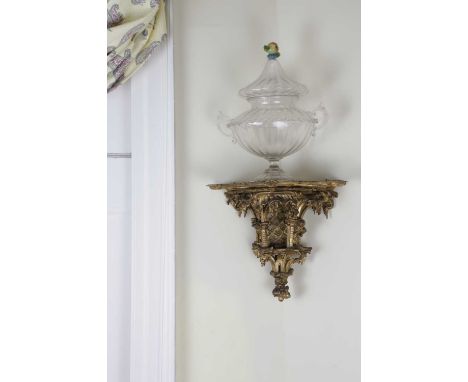 A PAIR OF VICTORIAN GILTWOOD BRACKETSIN CHIPPENDALE STYLE, 19TH CENTURYeach with a serpentine shelf with scrolling foliate ed