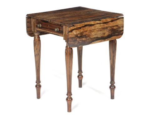 A RARE ANGLO-INDIAN CALAMANDER PEMBROKE TABLECEYLONESE, C.1820-30the drop-leaf top with a reeded edge above a frieze drawer a