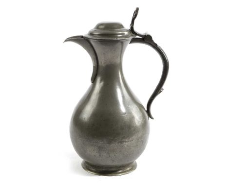 A PEWTER WINE HALF-GALLON JUGLONDON, C.1810marked under base with the touch of George Alderson, London, (fl. 1792-1826)29.2cm
