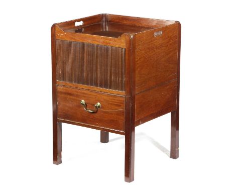 A GEORGE III MAHOGANY TRAY-TOP BEDSIDE COMMODELATE 18TH CENTURYwith a tambour shutter and pull-out base, fitted with a cerami
