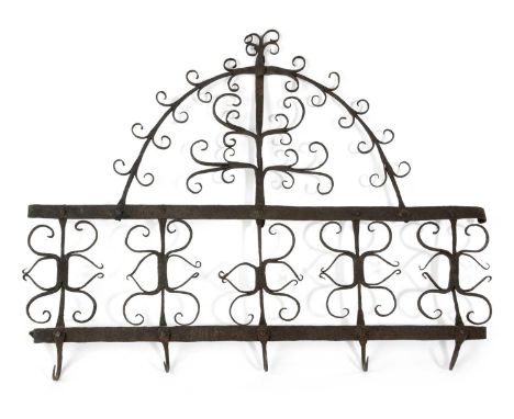 A WROUGHT IRON UTENSIL HOOKPROBABLY SPANISH, 18TH CENTURYwith scrolling decoration and five hooks38cm high, 50.5cm wideProven