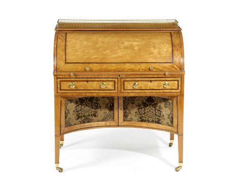 λ A GEORGE III SATINWOOD CYLINDER DESKC.1790-1800with purpleheart banding, the interior with an arrangement of pigeonholes an