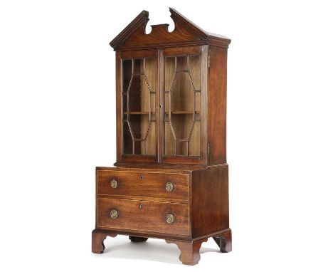 A MINIATURE GEORGE III MAHOGANY BOOKCASE CHEST LATE 18TH CENTURYpossibly an apprentice piece, the broken arch cornice above a