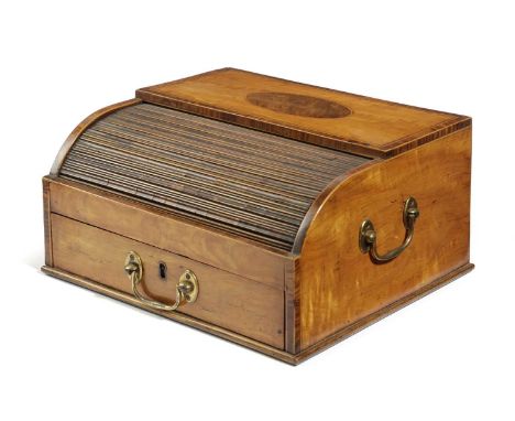 A GEORGE III SATINWOOD TRAVELLING TABLE BOXLATE 18TH CENTURYwith kingwood banding, the base drawer activating the tambour shu