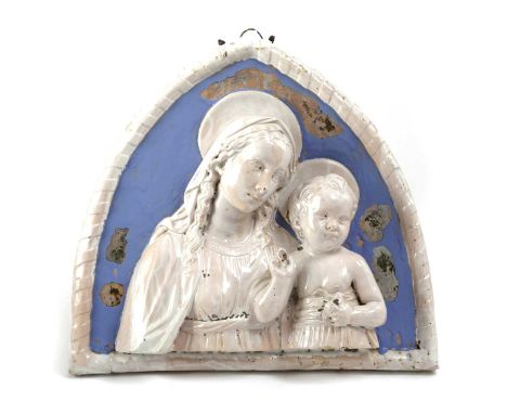 AN ITALIAN MAIOLICA VIRGIN AND CHILD PLAQUEIN DELLA ROBBIA STYLE, LATE 19TH / 20TH CENTURYin a pointed arched frame49cm high,