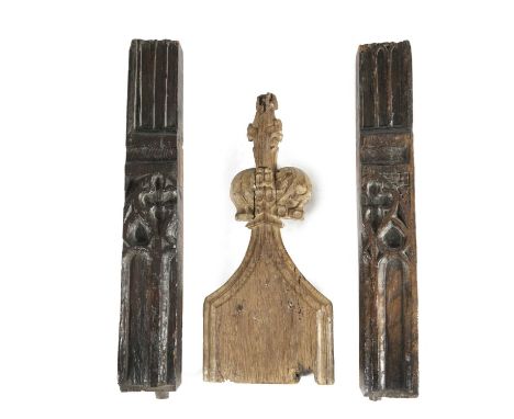 AN OAK PEW END EAST ANGLIA, 15TH CENTURYwith a poppy head terminal, above sloping moulded shoulders, together with two simila
