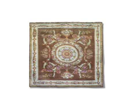 A LARGE FRENCH EMPIRE SAVONNERIE WOOL CARPETC.1810the deep brick red field with a large stylised flowerhead medallion inside 