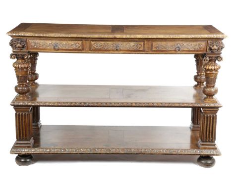 A WALNUT THREE TIER BUFFETBY MORANT & CO., IN RENAISSANCE STYLE, 19TH CENTURYthe rectangular top with a foliate carved border