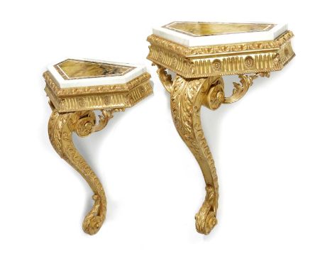 A PAIR OF GILTWOOD CONSOLE TABLESIN GEORGE III STYLE, 20TH CENTURYeach with a Siena and white marble top, above a fluted frie