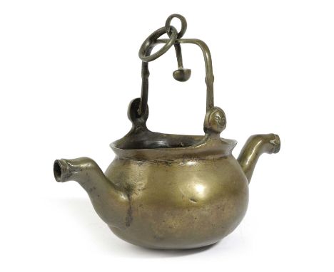 A FLEMISH BRONZE LAVABO16TH CENTURYwith a swing handle above female masks, the swollen body with a pair of mythical beast spo