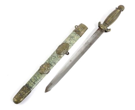 A CHINESE DAGGER19TH CENTURYwith a double edged blade, brass crossguard, grip and pommel, in a shagreen and brass scabbard wi